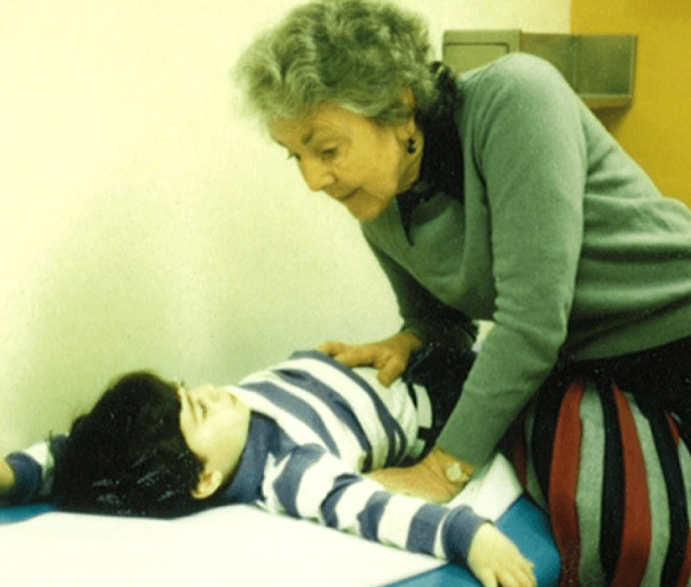 Dr. Audrey Evans with a child patient