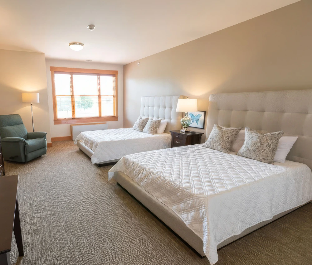 guest room with two queen beds ready for our next family